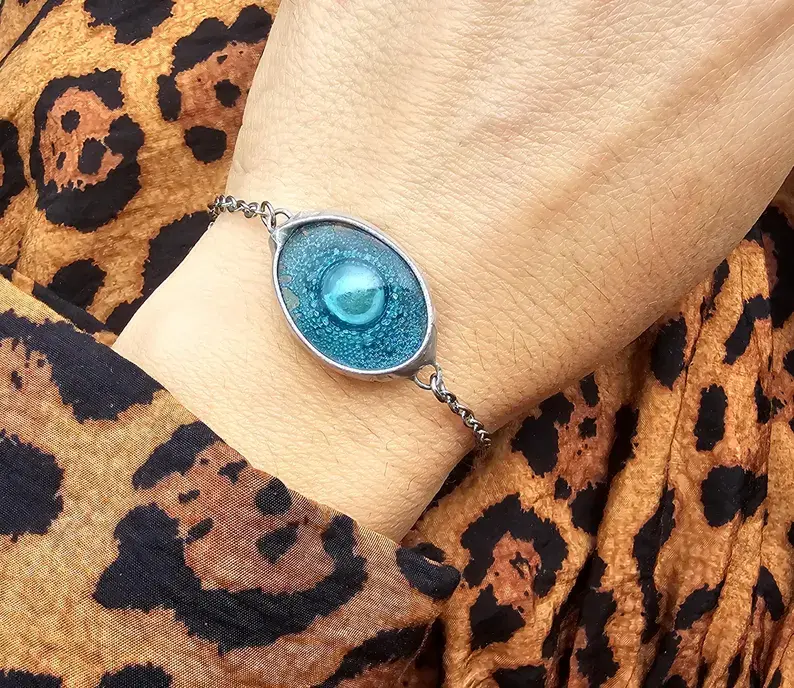 Owalna bransoletka z turkusowym szkiełkiem (oprawa w kolorze srebrnym)